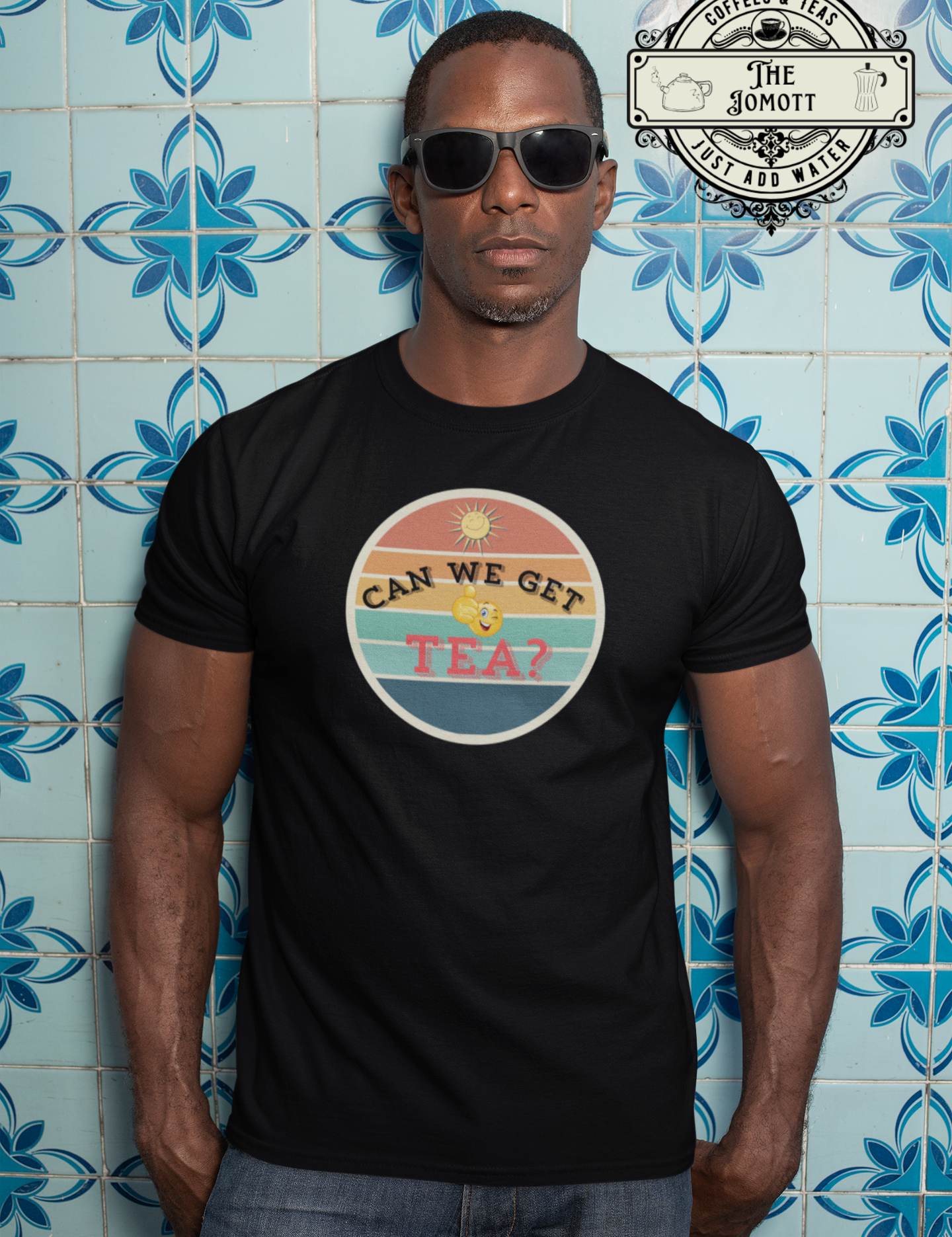 t-shirt-mockup-of-a-man-with-sunglasses-against-a-blue-tiling-30449.png